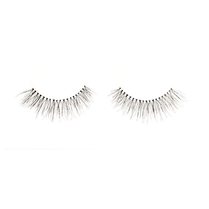 A floating Ardell Textureyes 581 upper faux lashes lay side by side with full volume and staggered lengths