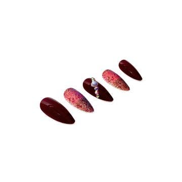 5-piece set of Ardell Nail Addict Studded Snakeskin artificial nails in a slanted position isolated in white color background